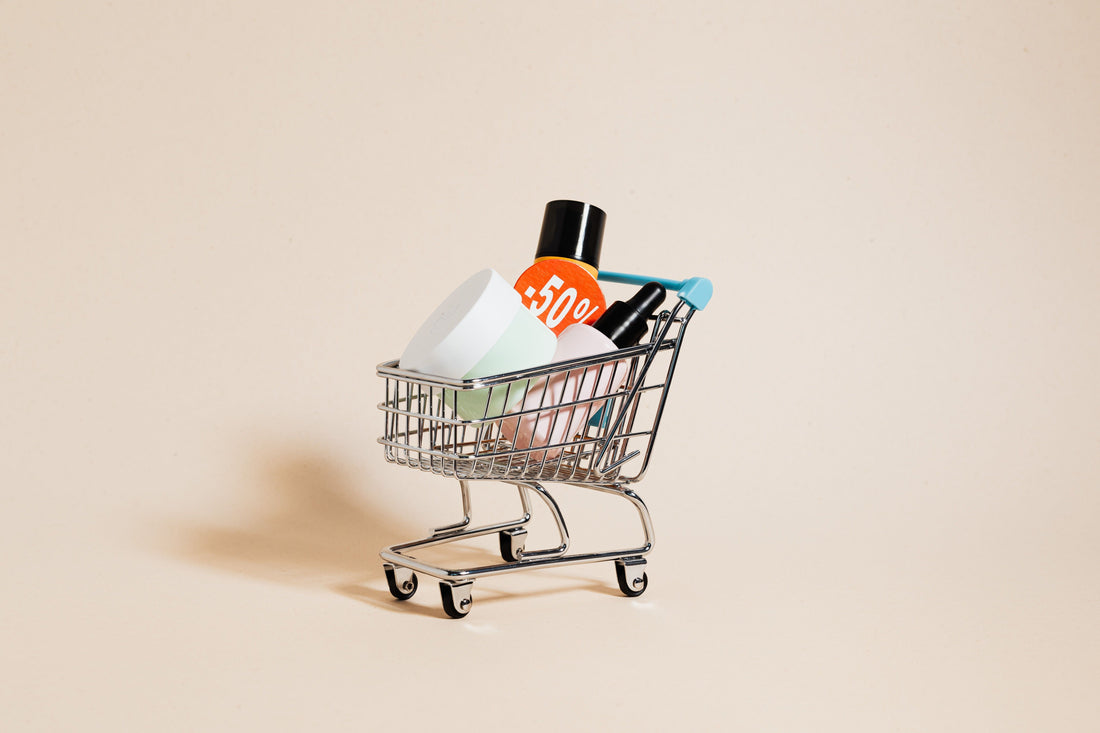 Shopping cart filled with discounted products, representing conditional rebate promotions, payout models, and promotional costs for ecommerce brands in 2026.