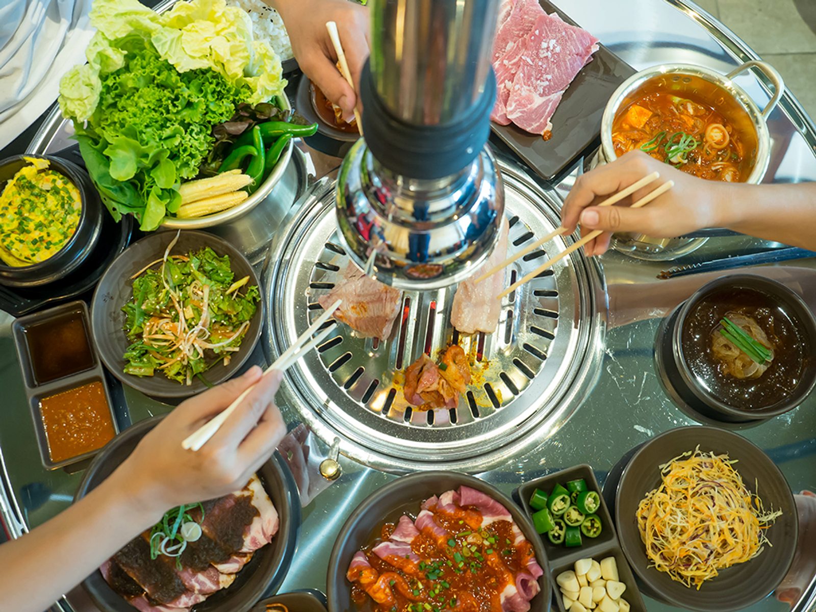 A full Korean BBQ table at Hanu